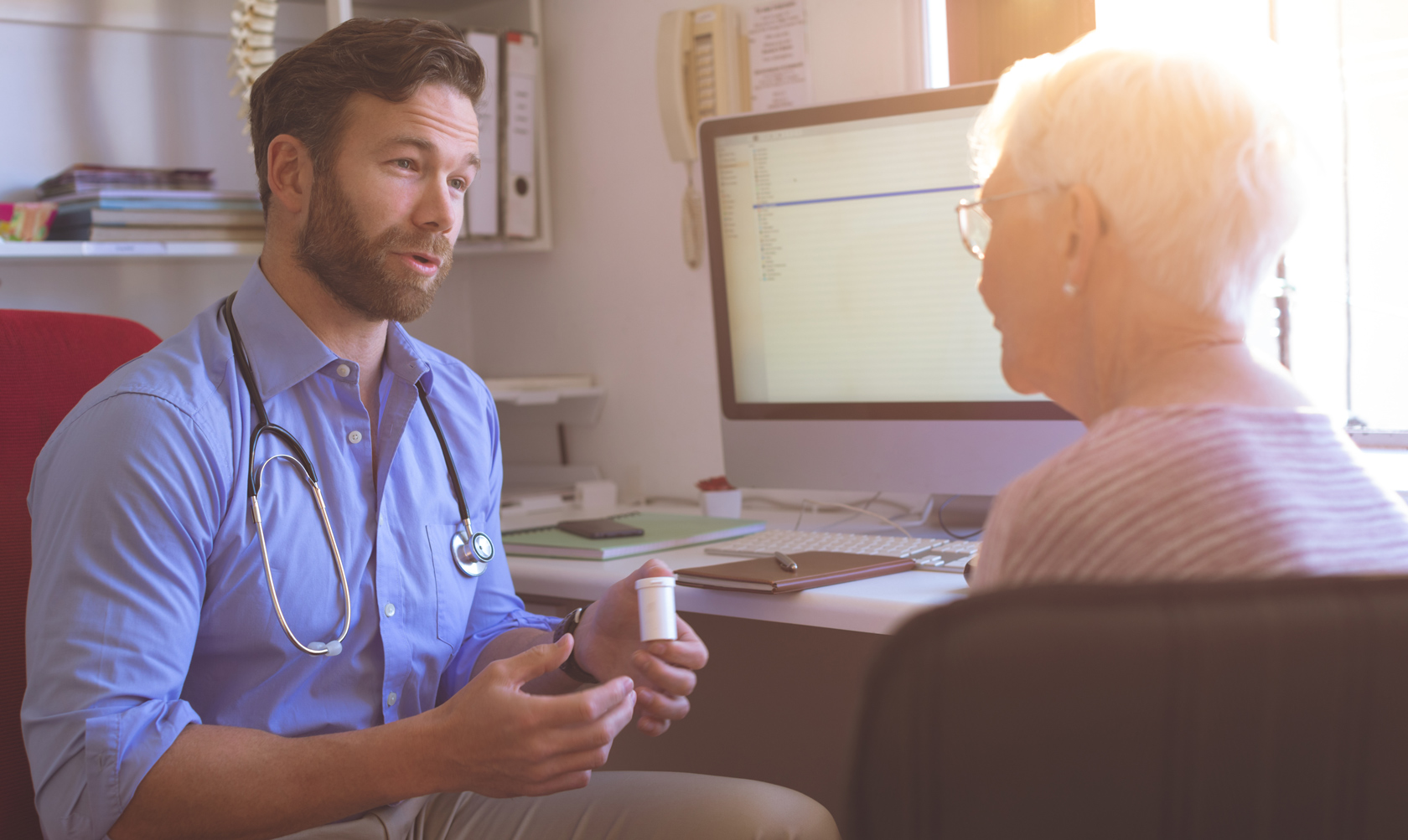 Provider helping patient